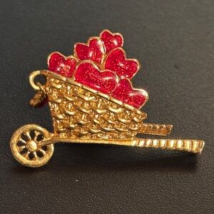 1992 Vintage Avon Garden of Love gold-tone wheelbarrow pin w/ red enamel hearts